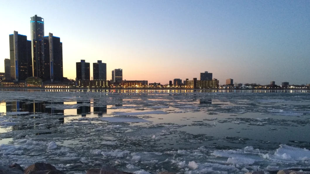 ice floats on the Detroit River against the backdrop of the city skyline - Photo by Nancy Duffy