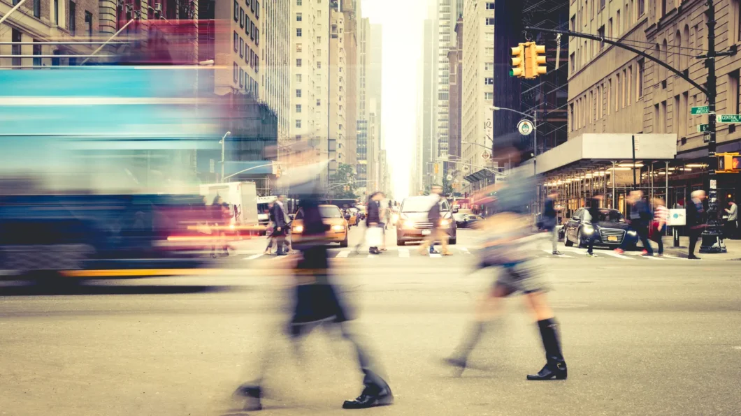 image of people walking on a city street