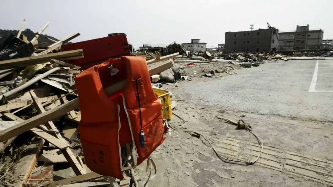 A View of debris and mud covered at Tsunami hit Destroyed city in Rikuzentakata on March 20, 2011, Japan. On 11 March 2011, an earthquake hit Japan with a magnitude of 9.0, the biggest in the nation's recorded history and one of the five most powerful recorded ever around the world. Within an hour of the earthquake, towns which lined the shore were flattened by a massive tsunami, caused by the energy released by the earthquake. With waves of up to four or five metres high, they crashed through civilians homes, towns and fields.