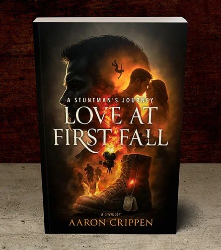 Book cover for Love at First Fall depicting an image of fire, army boots, army tags and a couple in the background.